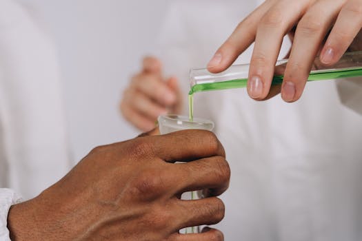 Chemists pouring Chemicals on a Boiling Mask