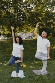 Man and Woman Doing Yoga Together