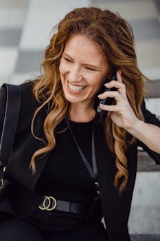 Smiling Woman Talking on the Phone