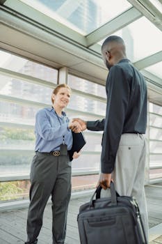 Two People Shaking Hands