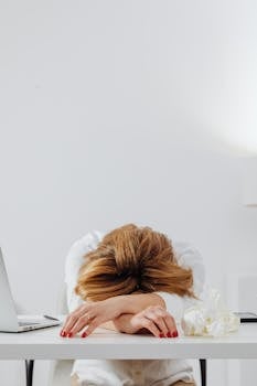 Woman Resting on White Table