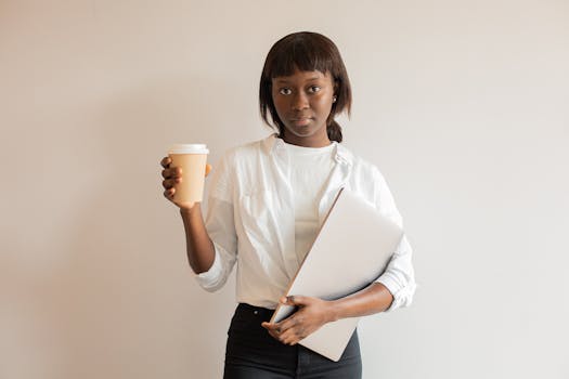 Woman holding Disposable Cup