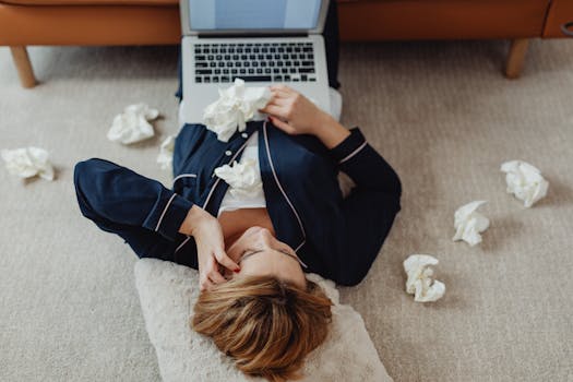 Woman in her Pajamas Using a Laptop